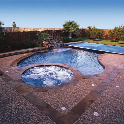 Backyard pool with automatic cover retracted